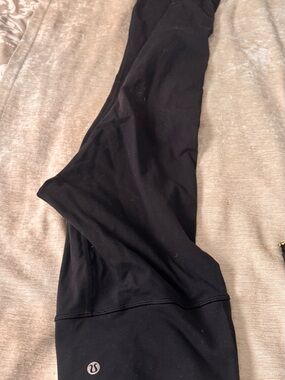 lululemon black activewear leggings with logo tag